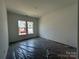 Bright bedroom with a window offering a view of the neighborhood at 3127 Beacon Heights Rd, Indian Land, SC 29707