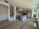 Spacious eat-in kitchen area with gray cabinets, a kitchen island with a sink, and stainless appliances at 3127 Beacon Heights Rd, Indian Land, SC 29707