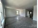 Bright living room featuring large windows and ample natural light at 3127 Beacon Heights Rd, Indian Land, SC 29707