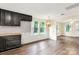 Beautiful kitchen area with wood floors, dark cabinetry, and updated stainless steel appliances at 315 Rivers St, Rock Hill, SC 29730