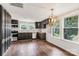 Modern kitchen featuring dark cabinets, butcher block countertops, and stainless-steel appliances at 315 Rivers St, Rock Hill, SC 29730