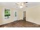 Bright living room features stylish flooring, ample natural light, and a freshly painted entrance door at 315 Rivers St, Rock Hill, SC 29730