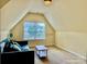 Bedroom showing a large window and comfortable seating area at 3678 Privette Rd # 349, Matthews, NC 28104
