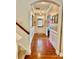 Inviting entryway with hardwood floors, wainscoting and archway to other rooms at 3678 Privette Rd # 349, Matthews, NC 28104