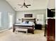 The main bedroom showcases vaulted ceiling, neutral paint, and wood furniture with lots of natural light at 3678 Privette Rd # 349, Matthews, NC 28104