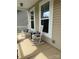 Front porch with two rocking chairs at 3678 Privette Rd # 349, Matthews, NC 28104