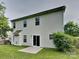 Back exterior view of a two-story home with vinyl siding and a patio at 3711 Green Pasture Rd, Charlotte, NC 28269