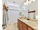 Bathroom with granite countertops, tiled floor, and decorative fixtures at 3801 Creek Ridge Dr, Denver, NC 28037