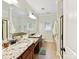Spacious bathroom features dual vanities, granite countertops, and tile flooring at 3801 Creek Ridge Dr, Denver, NC 28037