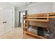 Cozy bedroom featuring bunk beds, carpet flooring, and ample closet space at 3801 Creek Ridge Dr, Denver, NC 28037