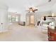 Spacious bonus room featuring bunk beds, ceiling fan, and carpet flooring at 3801 Creek Ridge Dr, Denver, NC 28037