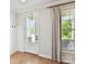 Bright entryway featuring hardwood floors, a decorative door, and ample natural light at 3801 Creek Ridge Dr, Denver, NC 28037