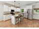 Beautiful kitchen featuring white cabinets, granite countertops, and stainless steel appliances at 3801 Creek Ridge Dr, Denver, NC 28037