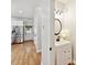 A charming powder room with white vanity and modern fixtures, located off the kitchen at 3801 Creek Ridge Dr, Denver, NC 28037