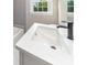 The bathroom vanity features sleek hardware, a modern faucet, and a solid surface counter at 3920 Admiral Ave, Charlotte, NC 28205