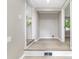 The hallway area includes updated flooring, recessed lights, and fresh neutral paint at 3920 Admiral Ave, Charlotte, NC 28205