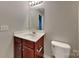 This bathroom features a vanity with sink and a toilet at 4006 Lawrence Daniel Dr, Matthews, NC 28104