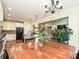 Spacious kitchen features a dining area, stainless appliances, and ample counter space at 410 Deer Brush Ln, Waxhaw, NC 28173