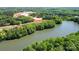 An aerial view of a lake with trees at 4134 Eastover Glen Rd # 0319, Charlotte, NC 28269