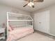 Charming bedroom with house-shaped bed, soft rug, and lovely decor at 4205 Bent Green Ln, Monroe, NC 28112