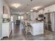 Bright and airy kitchen featuring a large island, stainless steel appliances, and open layout at 4205 Bent Green Ln, Monroe, NC 28112