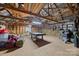 Spacious barn interior featuring wooden beams and plenty of storage space at 425 Troutman Rd, Rockwell, NC 28138
