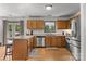 Bright kitchen features stainless steel appliances, wooden cabinets, and a spacious island at 425 Troutman Rd, Rockwell, NC 28138