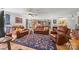 Inviting living room showcasing an open-concept design with hardwood floors and stylish furniture at 425 Troutman Rd, Rockwell, NC 28138