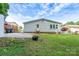 Home's backyard featuring a patio and well-maintained lawn at 4500 Ridgeley Dr, Charlotte, NC 28208
