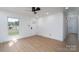 Bright living room with light wood flooring and ample natural light at 4500 Ridgeley Dr, Charlotte, NC 28208