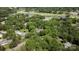Aerial view of lush, green landscape and private pool at 4920 Parview S Dr, Charlotte, NC 28226