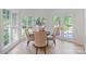 Bright dining area with ample natural light, hardwood floors, and backyard views, perfect for casual meals at 4920 Parview S Dr, Charlotte, NC 28226