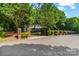 Gated brick entrance to a tree-lined estate at 4920 Parview S Dr, Charlotte, NC 28226