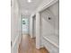Long hallway featuring hardwood floors and recessed lighting at 4920 Parview S Dr, Charlotte, NC 28226