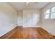 Bedroom features hardwood floors, two closets and a window at 504 Forest Ridge Dr, Shelby, NC 28152