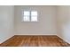 Bedroom with hardwood floors, a window, and baseboard trim at 504 Forest Ridge Dr, Shelby, NC 28152