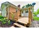 Wooden deck offers a cozy outdoor space with access to the backyard, ideal for relaxation and entertaining at 504 Forest Ridge Dr, Shelby, NC 28152