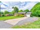 Well-maintained home with a long driveway and mature trees at 504 Forest Ridge Dr, Shelby, NC 28152