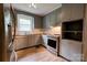 Kitchen featuring stainless steel appliances, solid surface countertops, and wooden cabinets at 504 Forest Ridge Dr, Shelby, NC 28152