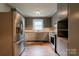 Well-lit kitchen area with modern appliances and ample cabinet storage at 504 Forest Ridge Dr, Shelby, NC 28152