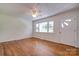 Living room featuring hardwood floors, a ceiling fan, and natural light at 504 Forest Ridge Dr, Shelby, NC 28152