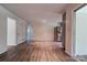 Open-concept living space with view to stainless steel refrigerator and exterior at 504 Forest Ridge Dr, Shelby, NC 28152