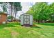 Outdoor storage shed in the backyard, offering practical space for storing tools and equipment at 504 Forest Ridge Dr, Shelby, NC 28152