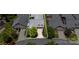 Charming home featuring lush landscaping and a well-maintained front yard with an attached two car garage at 5214 Polo Gate Blvd, Charlotte, NC 28216