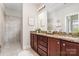 Bathroom with double vanity and shower at 5214 Polo Gate Blvd, Charlotte, NC 28216