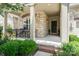 Charming front porch with stone pillars and black iron railings, leading to the front door at 5214 Polo Gate Blvd, Charlotte, NC 28216