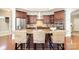 Gorgeous kitchen featuring a center island, stainless steel appliances, and wooden cabinetry at 5214 Polo Gate Blvd, Charlotte, NC 28216
