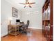 Cozy home office with built-in bookshelves and a classic wooden desk at 5214 Polo Gate Blvd, Charlotte, NC 28216