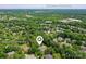 Expansive aerial view showcasing neighborhood proximity to Marvin Elementary, near Uptown Charlotte at 552 Wyndham Ln, Marvin, NC 28173