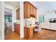 Bright home office with custom built-ins, desk, and ample workspace, adjacent to a sitting room at 552 Wyndham Ln, Marvin, NC 28173